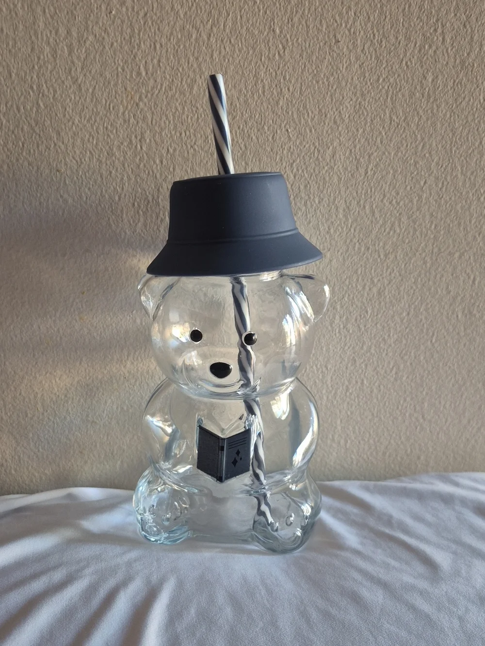 Clear Bear-Shaped Drinking Cup with Gray Lid and Striped Straw